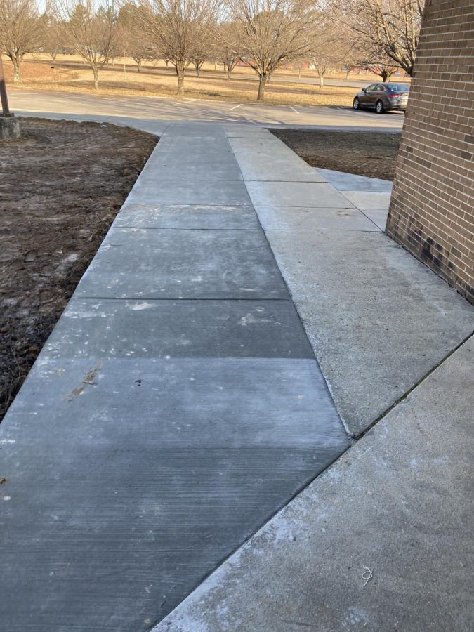 CCCHS installs a new sidewalk for car riders, walkers, and others.