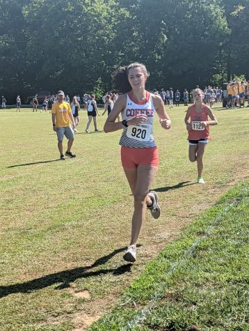 Junior Kailee Rossman pushes toward the finish line at state.