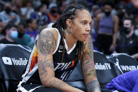 Phoenix Mercury player Brittney Griner rests during game two of the WNBA finals against the Chicago Sky.
