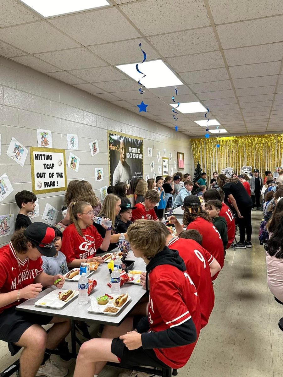 CCHS+softball+and+baseball+players+enjoy+lunch+with+the+students+of+Hickerson+Elementary.